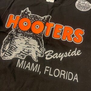 Hooters 20th Anniversary Outfit 
Top MediumBottom Large 
70%Cotton30%Polyester